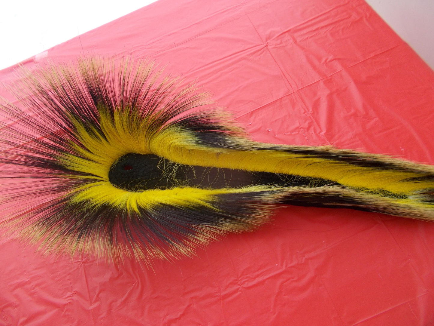 17 1/2 in Porcupine guard hair roach with black yarn base with multi color deer hair out side and out 8 1/2" porcupine hair in front