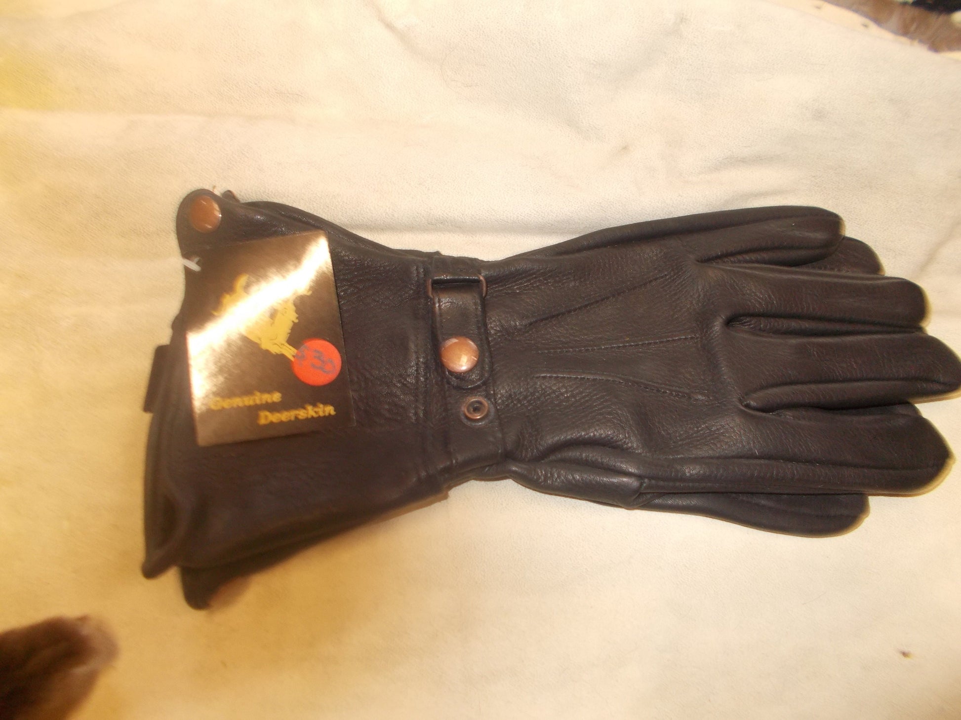 Here I have genuine black deer skin gauntlets gloves they come in small medium large extra large and 2 x large